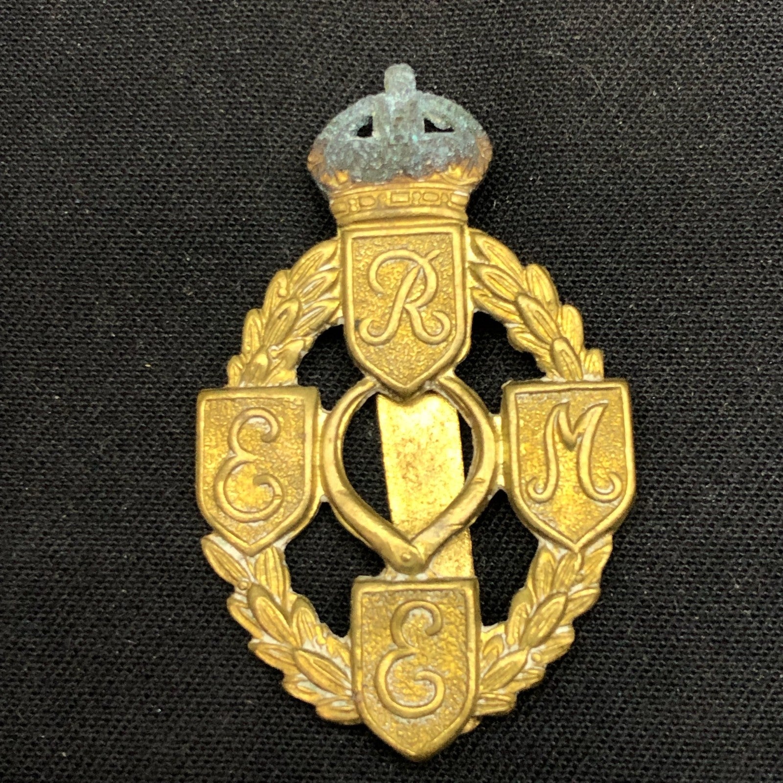 Original British Army Cap Badge - Royal Electrical and Mechanical Engineers - The Militaria Shop