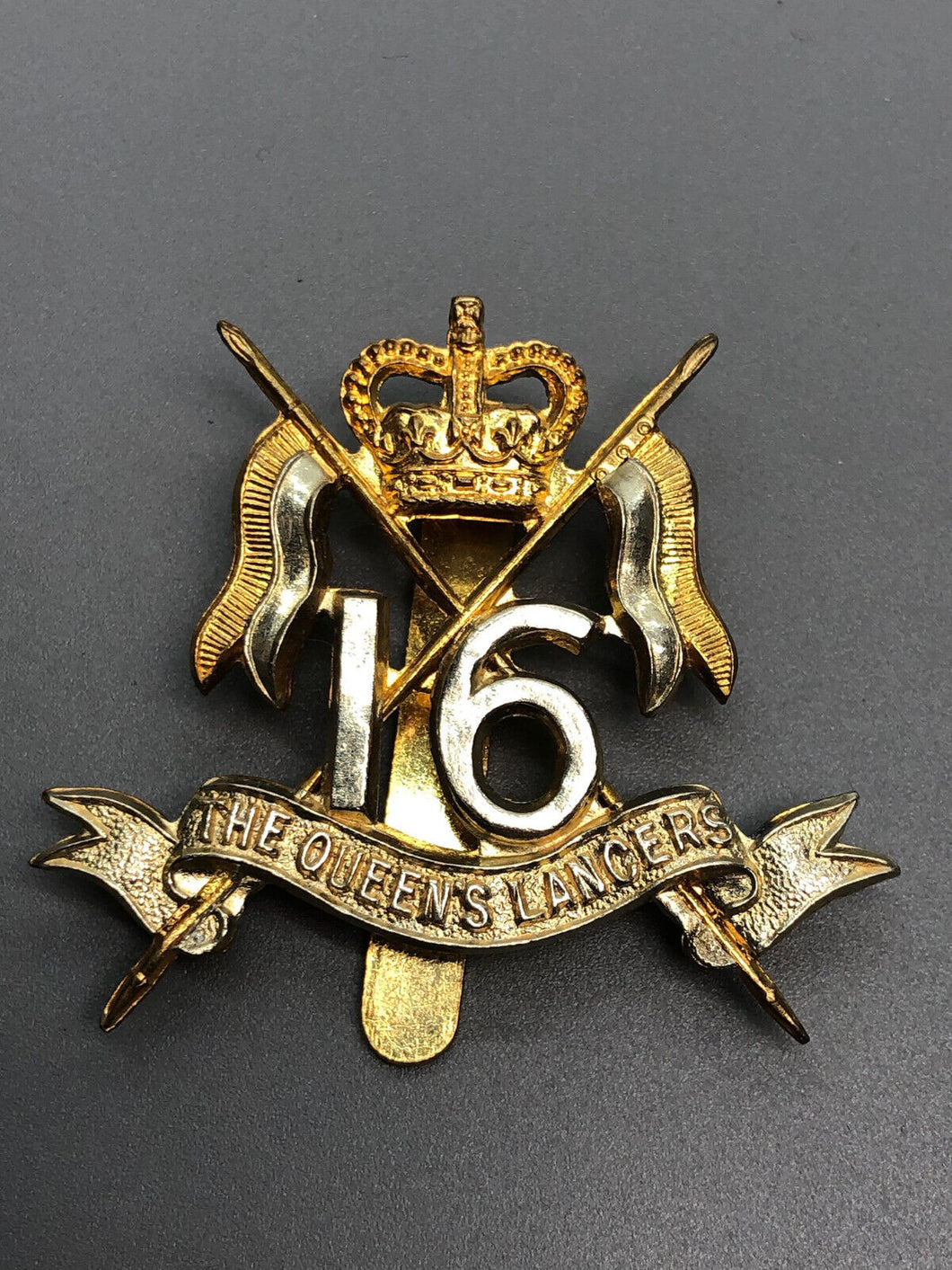 Genuine British Army 16th The Queen's Lancers Cap Badge