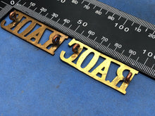 Load image into Gallery viewer, Original Pair of WW2 Brass British Army Shoulder Titles RAOC Army Ordnance Corps
