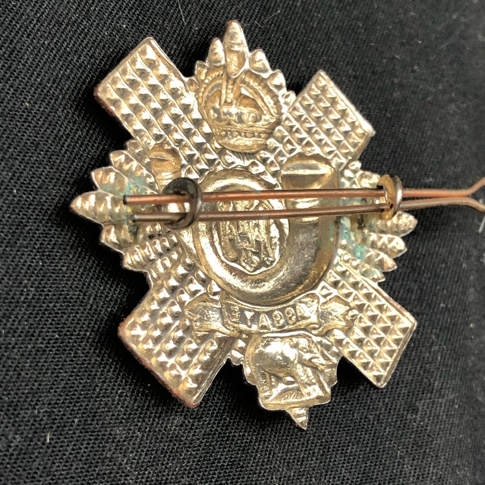Original WW2 British Army Cap Badge - Highland Light Infantry - The Militaria Shop