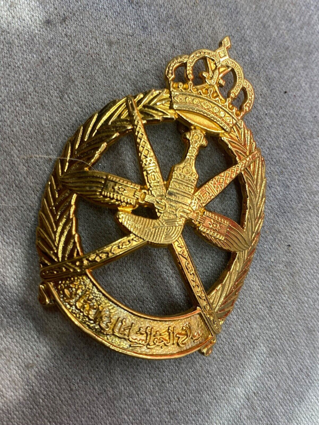 Original Oman Airforce Cap Badge in Gilt Metal with Rear Fixing Screws