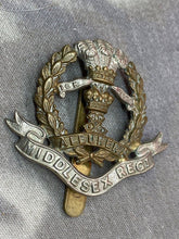 Load image into Gallery viewer, Original British Army WW1 / WW2 Middlesex Regiment Cap Badge
