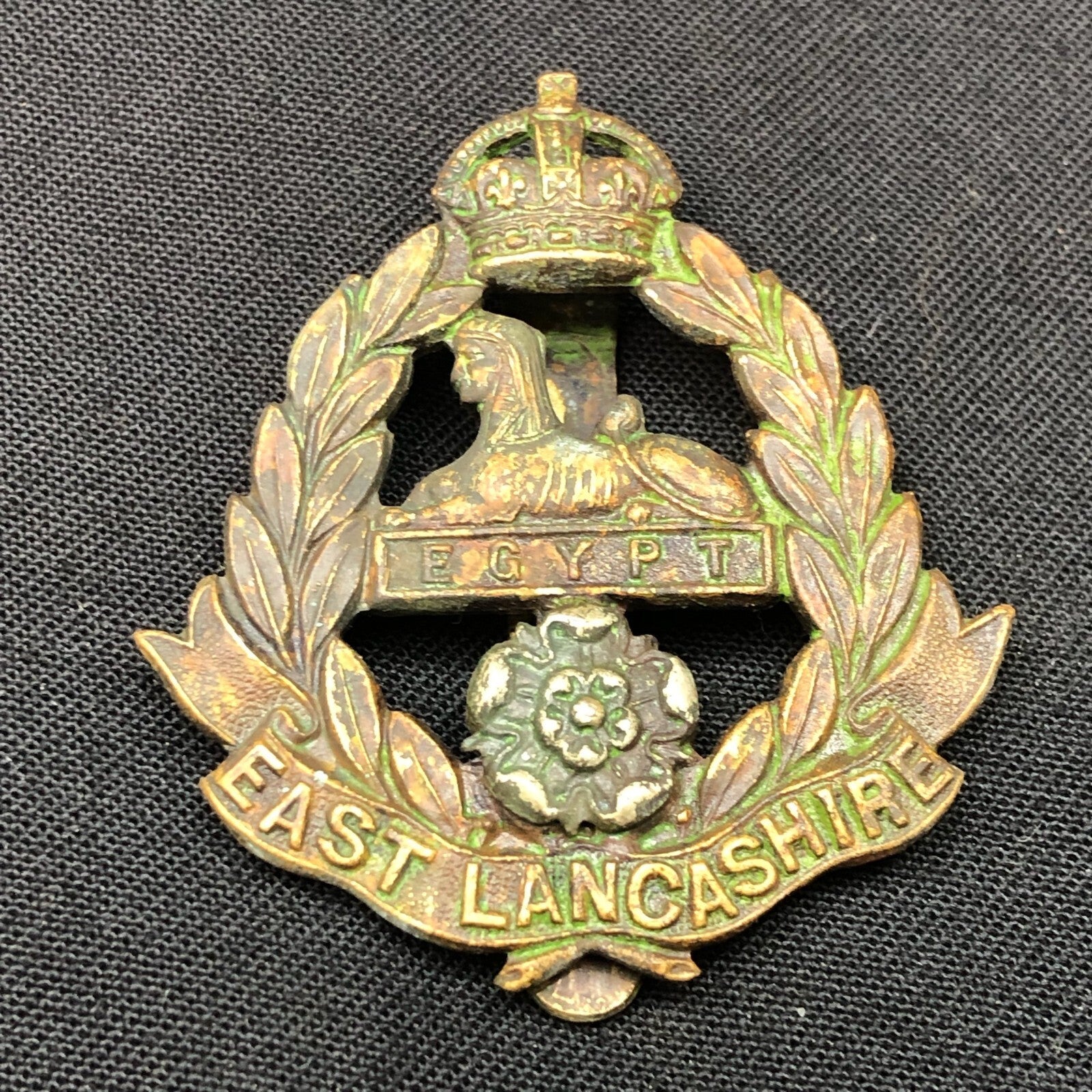 Genuine British Army Cap Badge - East Lancashire Regiment - The Militaria Shop