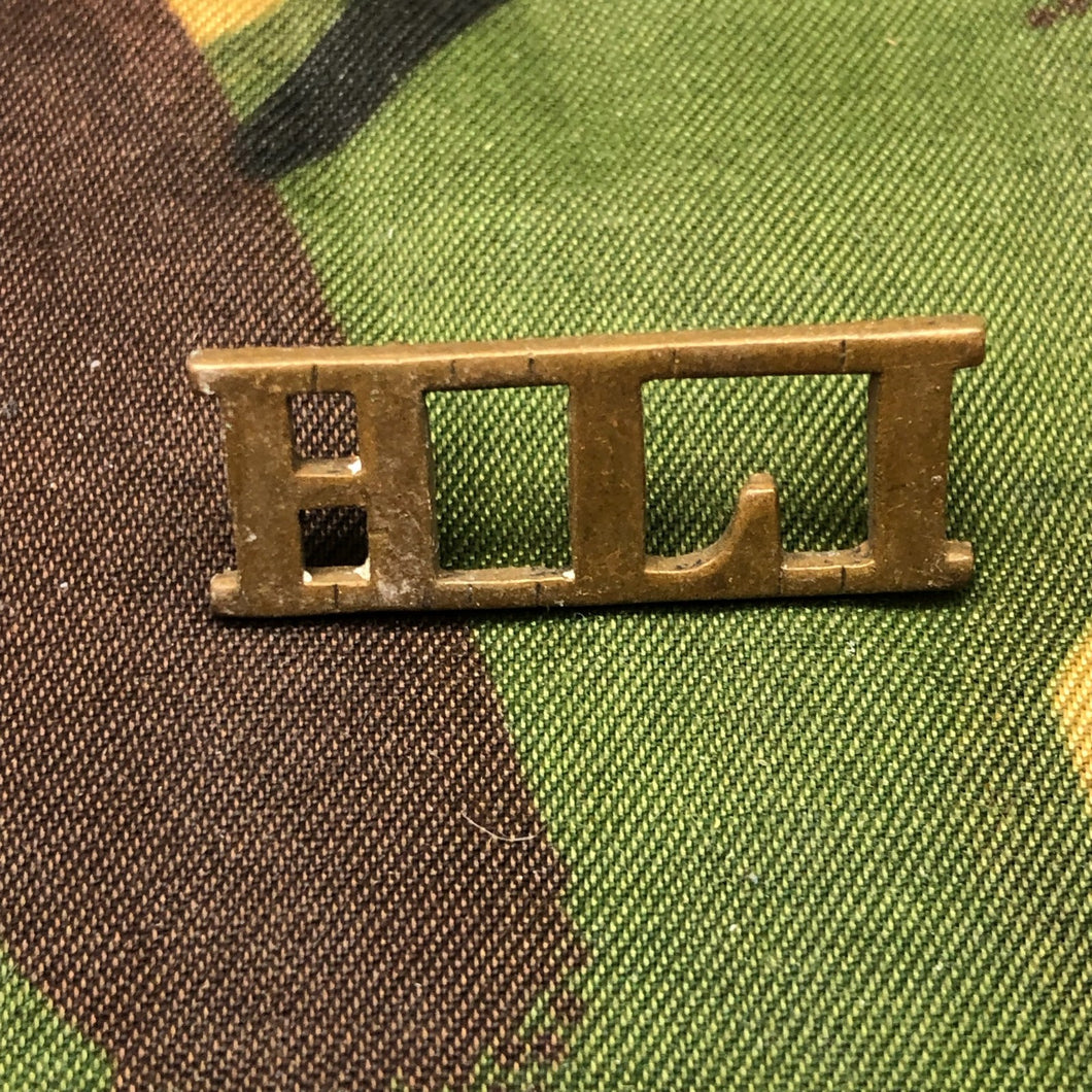 Genuine British Army WW1 Brass Shoulder Title - Highland Light Infantry HLI - The Militaria Shop