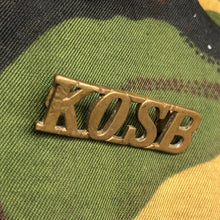 Load image into Gallery viewer, Genuine British Army WW1 Brass Shoulder Title - Kings Own Scottish Borderers - The Militaria Shop
