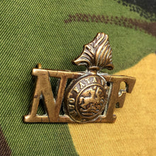 Load image into Gallery viewer, Genuine British Army WW1 Brass Shoulder Title - Northumberland Fusiliers - The Militaria Shop
