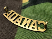 Load image into Gallery viewer, Genuine Canadian Army WW1 Brass Shoulder Title - CANADA - The Militaria Shop
