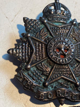 Load image into Gallery viewer, Original British Army WW1 / WW2 Border Regiment Blackened Cap Badge
