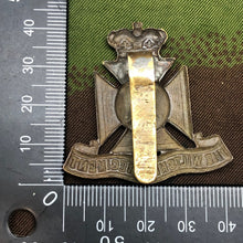 Load image into Gallery viewer, Original WW2 British Army Cap Badge - The Wiltshire Regiment - The Militaria Shop

