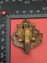Load image into Gallery viewer, Original WW2 British Army Kings Crown Cap Badge - East Surrey Regiment

