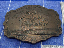 Load image into Gallery viewer, Interesting Large Metal Livingstone Wells &amp; Co Belt Buckle
