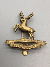 Load image into Gallery viewer, Original WW1 British Army Cap Badge - Huntingdon Cyclist Battalion
