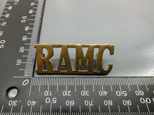 Load image into Gallery viewer, Original WW2 British Army RAMC Royal Army Medical Corps Brass Shoulder Title
