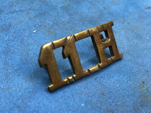 Load image into Gallery viewer, Original WW2 British Army 11th Hussars Brass Shoulder Title
