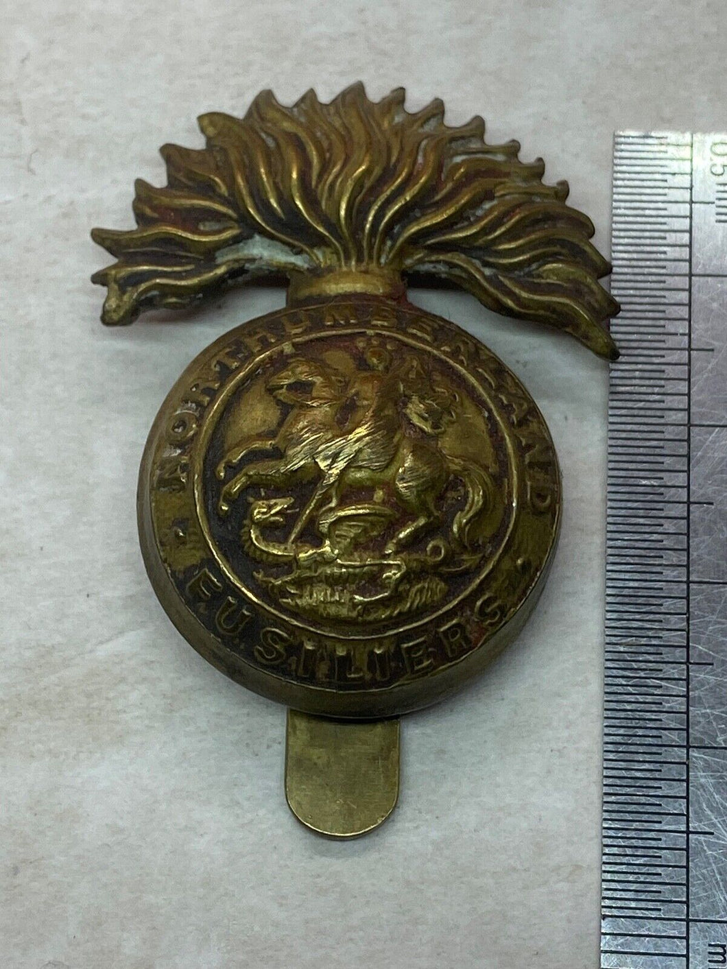 WW1 British Army Northumberland Fusiliers Regiment Cap Badge