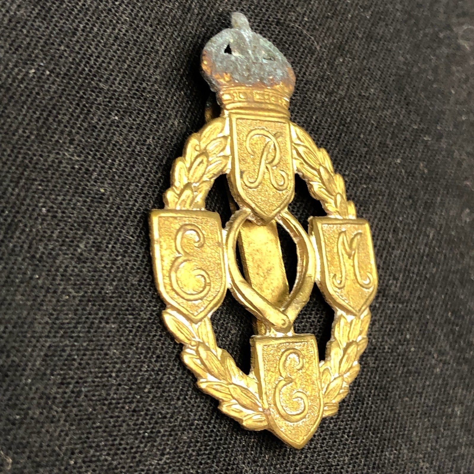 Original British Army Cap Badge - Royal Electrical and Mechanical Engineers - The Militaria Shop