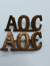 Load image into Gallery viewer, Original WW1 British Army Ordnance Corps (A.O.C.) Shoulder Titles
