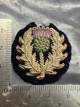 Load image into Gallery viewer, Original British Army WW1 - 9th Scottish Regiment Sleeve Badge - Unissued
