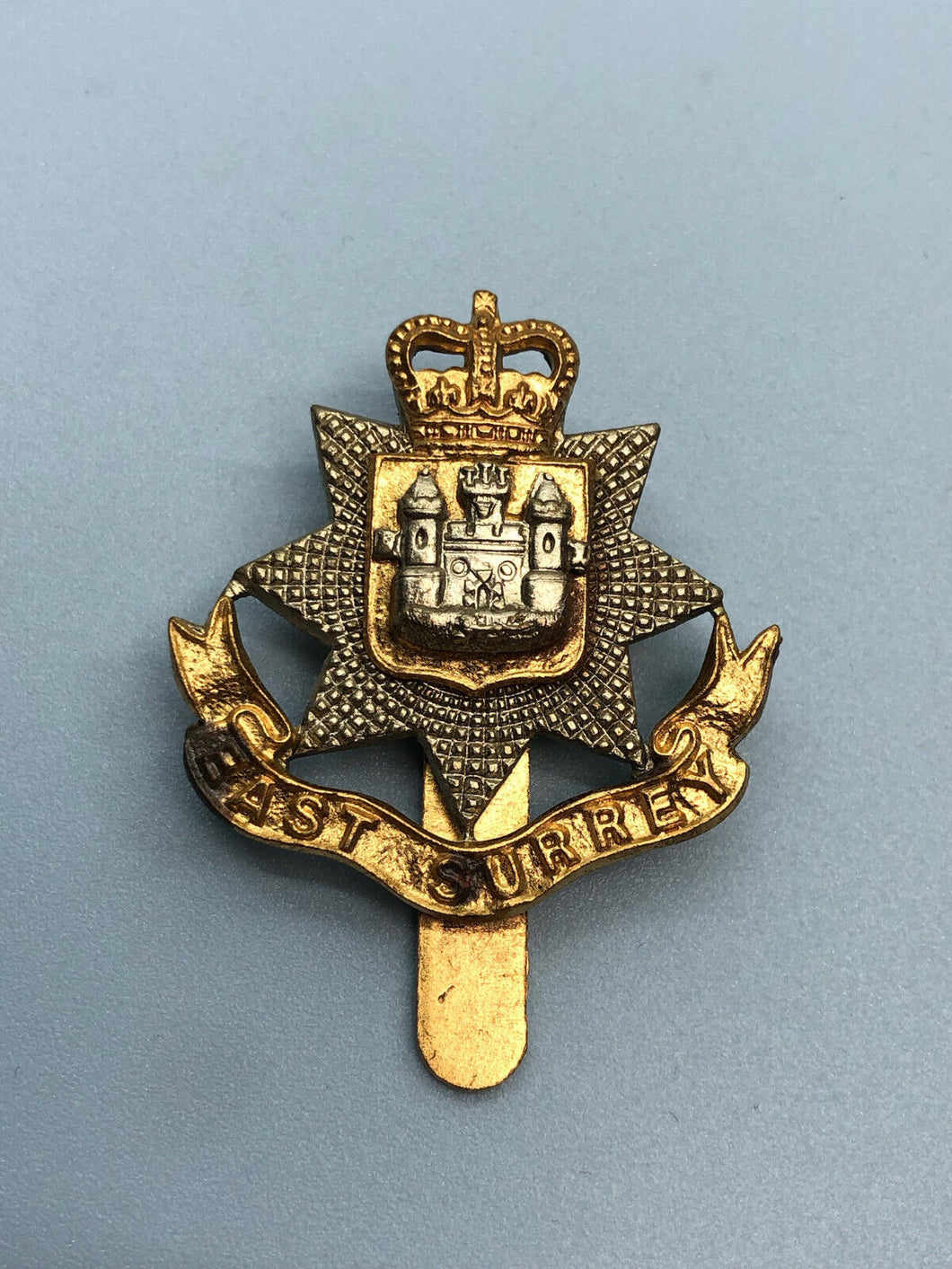 Genuine British Army East Surrey Regiment Cap Badge