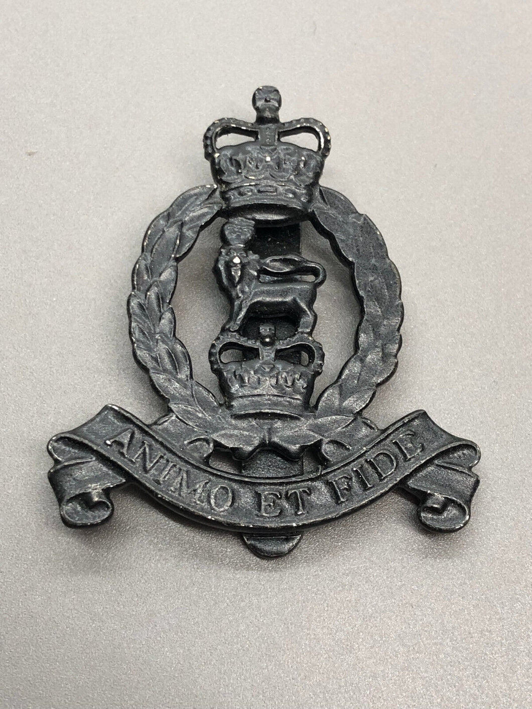 Genuine British Army Blackened Adjutant General's Corps Cap Badge