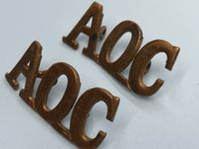 Load image into Gallery viewer, Original WW1 British Army Ordnance Corps (A.O.C.) Shoulder Titles
