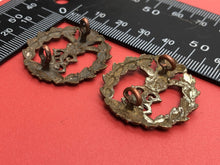 Load image into Gallery viewer, Original WW2 British Army Middlesex Regiment Collar Badge Pair
