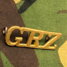 Genuine British Army WW1 Brass Shoulder Title - Unknown G.R.Z - The Militaria Shop