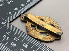 Load image into Gallery viewer, Original British Army WW2 Cap Badge - REME Royal Electrical Mechanical Engineers
