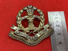 Load image into Gallery viewer, Original British Army WW1 Middlesex Regiment Public Works Pioneer Btn Cap Badge
