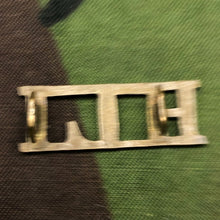 Load image into Gallery viewer, Genuine British Army WW1 Brass Shoulder Title - Highland Light Infantry HLI - The Militaria Shop
