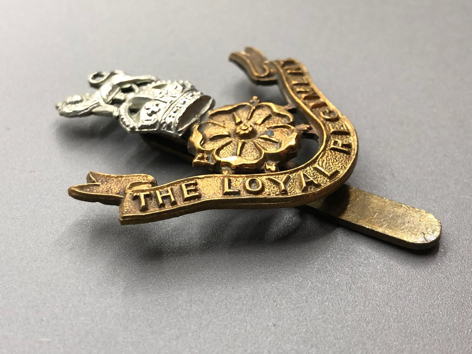 Original WW2 British Army The Loyal Regiment Cap Badge - The Militaria Shop