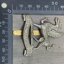 Load image into Gallery viewer, Original WW1 British Army 2nd Battalion Monmouthshire Regiment Cap Badge
