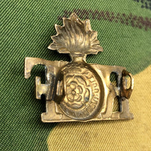 Load image into Gallery viewer, Genuine British Army WW1 Brass Shoulder Title - Royal Fusiliers - The Militaria Shop
