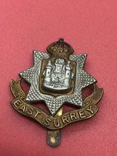 Load image into Gallery viewer, Original WW2 British Army Kings Crown Cap Badge - East Surrey Regiment
