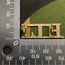 Load image into Gallery viewer, Genuine British Army WW1 Brass Shoulder Title - Highland Light Infantry HLI - The Militaria Shop
