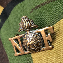 Load image into Gallery viewer, Genuine British Army WW1 Brass Shoulder Title - Northumberland Fusiliers - The Militaria Shop
