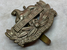 Load image into Gallery viewer, Original British Army WW1 / WW2 Gloucestershire Regiment Cap Badge
