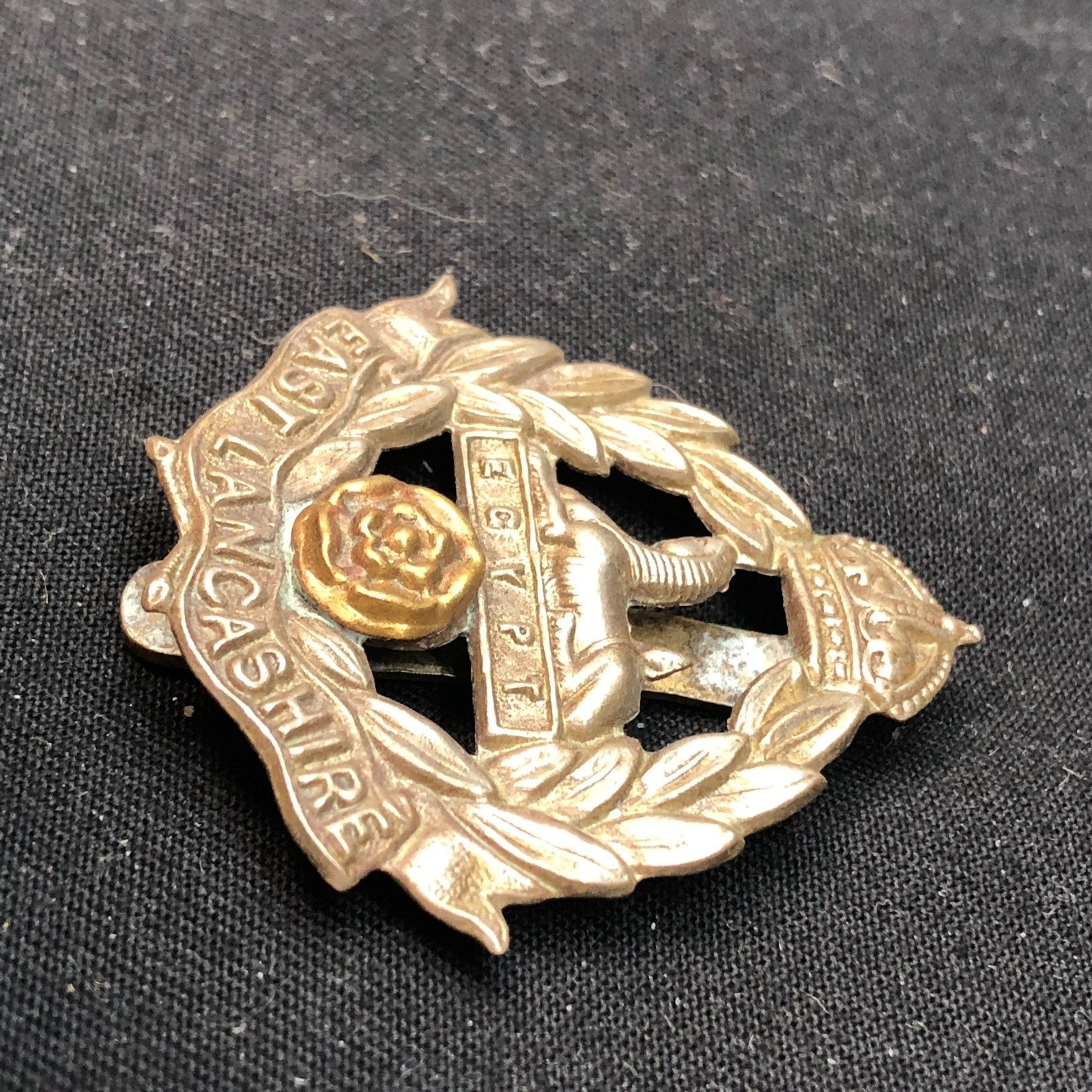 Genuine WW2 British Army Brass Cap Badge - East Lancashire Regiment - The Militaria Shop