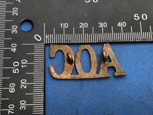 Load image into Gallery viewer, Original WW1 British Army Ordinance Corps Brass Shoulder Title
