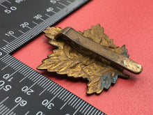 Load image into Gallery viewer, Original WW2 Canadian Army General Service Cap Badge
