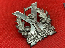 Load image into Gallery viewer, Original WW1/WW2 British Army Tyneside Scottish Regiment Cap Badge
