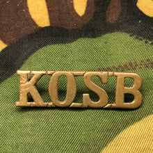 Load image into Gallery viewer, Genuine British Army WW1 Brass Shoulder Title - Kings Own Scottish Borderers - The Militaria Shop

