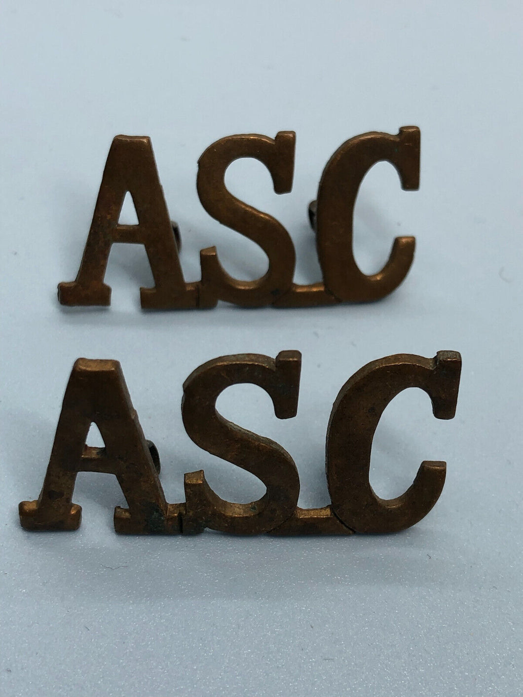 Original WW1 British Army Service Corps (A.S.C.) Shoulder Titles