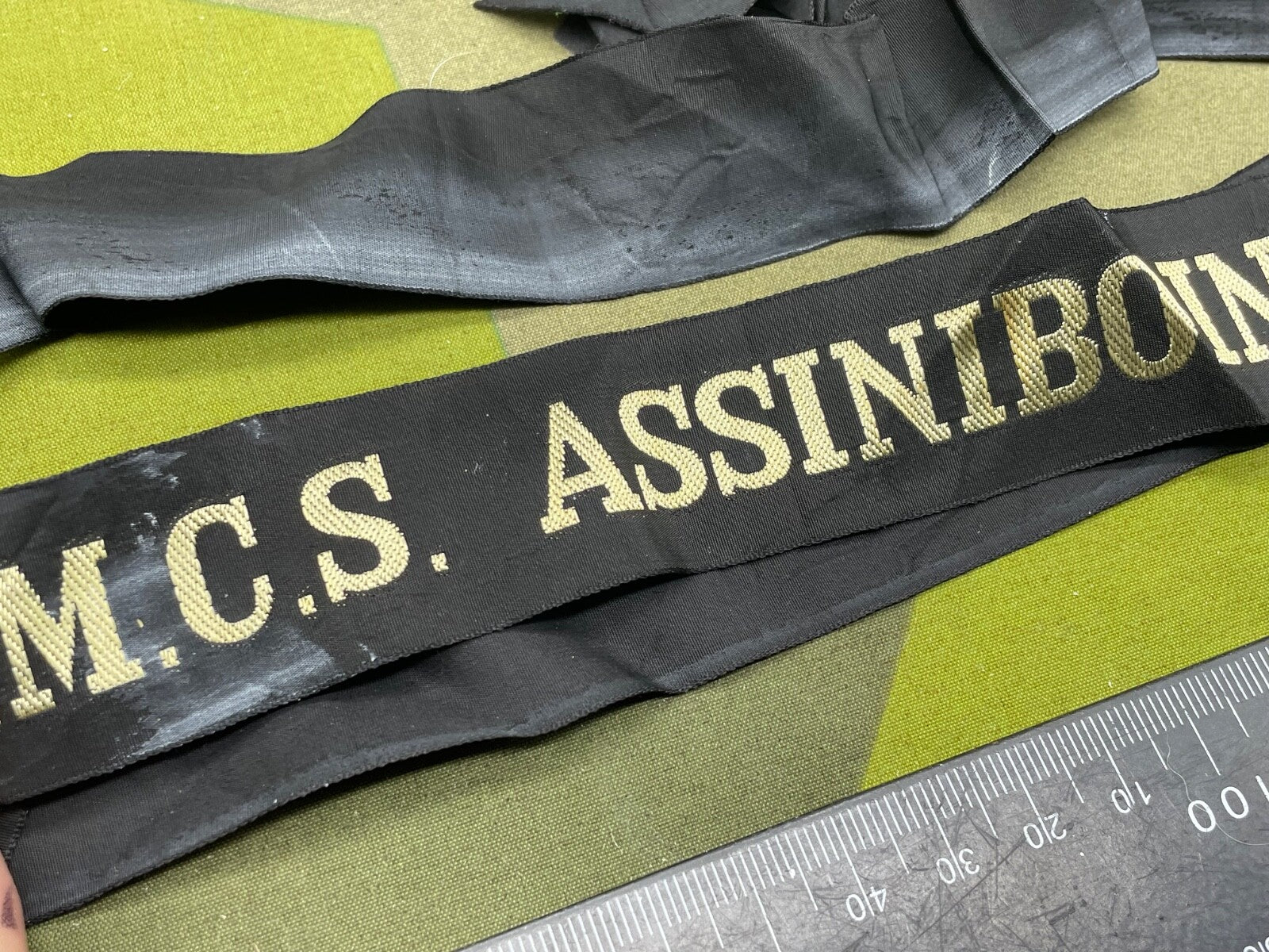 Original British Royal Navy Cap Tally for HMS Assiniboine - The Militaria Shop