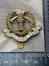 Load image into Gallery viewer, Original British Army WW1 / WW2 Middlesex Regiment Cap Badge
