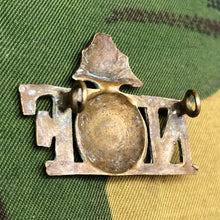 Load image into Gallery viewer, Genuine British Army WW1 Brass Shoulder Title - Northumberland Fusiliers - The Militaria Shop
