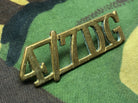 Genuine British Army WW2 Brass Shoulder Title - 4th/7th Dragoon Guards - The Militaria Shop