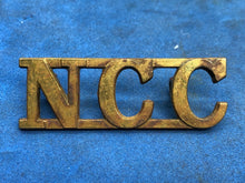 Load image into Gallery viewer, Original WW2 British Army Non Combatant Corps (N.C.C.) Brass Shoulder Title
