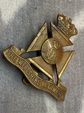 Load image into Gallery viewer, Original British Army WW1 / WW2 The Wiltshire Regiment Cap Badge
