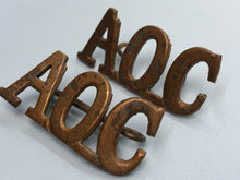 Load image into Gallery viewer, Original WW1 British Army Ordnance Corps (A.O.C.) Shoulder Titles
